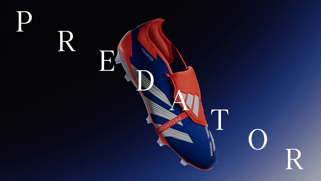 This is an image of a Predator soccer cleat designed by Adidas, with the words "PREDATOR" indicating the type and model number. 