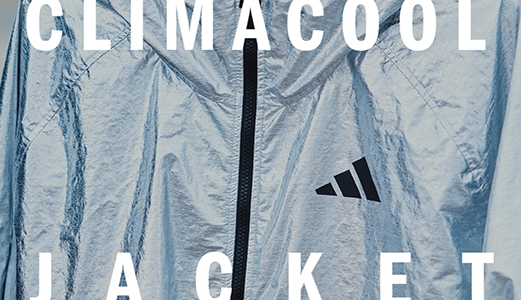 Silver adidas climacool jacket with front zipper. (Photo)